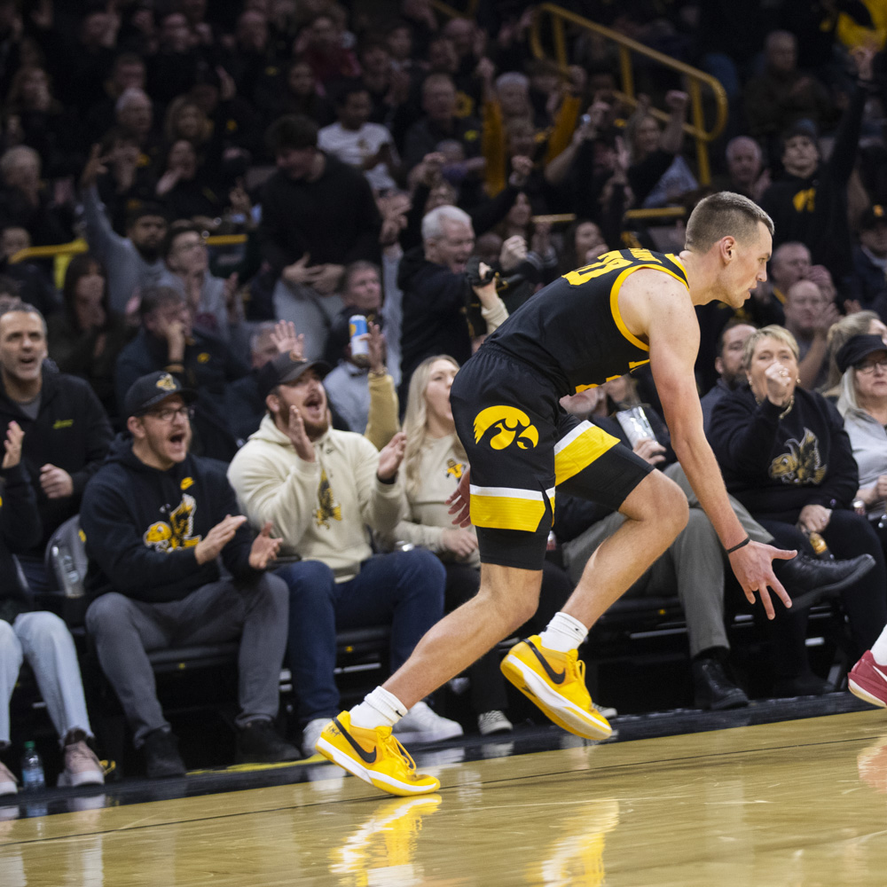 Iowa’s Payton Sandfort celebrates a three-pointer during a men’s basketball game between Iowa and Iowa State at Carver-Hawkeye Arena on Dec. 12, 2024. The Cyclones defeated the Hawkeyes, 89-80.