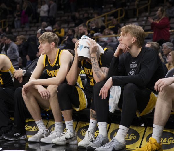 Iowa players react to the Hawkeyes loss during a men’s basketball game between Iowa and Iowa State at Carver-Hawkeye Arena on Dec. 12, 2024. The Cyclones defeated the Hawkeyes, 89-80.