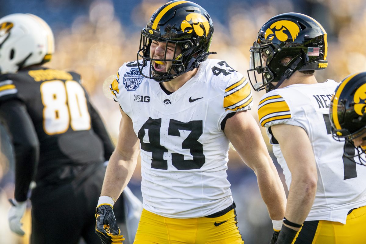 Iowa linebacker Karson Sharar celebrates a tackle during the TransPerfect Music City Bowl between Iowa and Missouri at Nissan Stadium in Nashville, Tenn., on Monday, Dec. 30, 2024. Following the first half, Iowa leads Missouri 21-14.