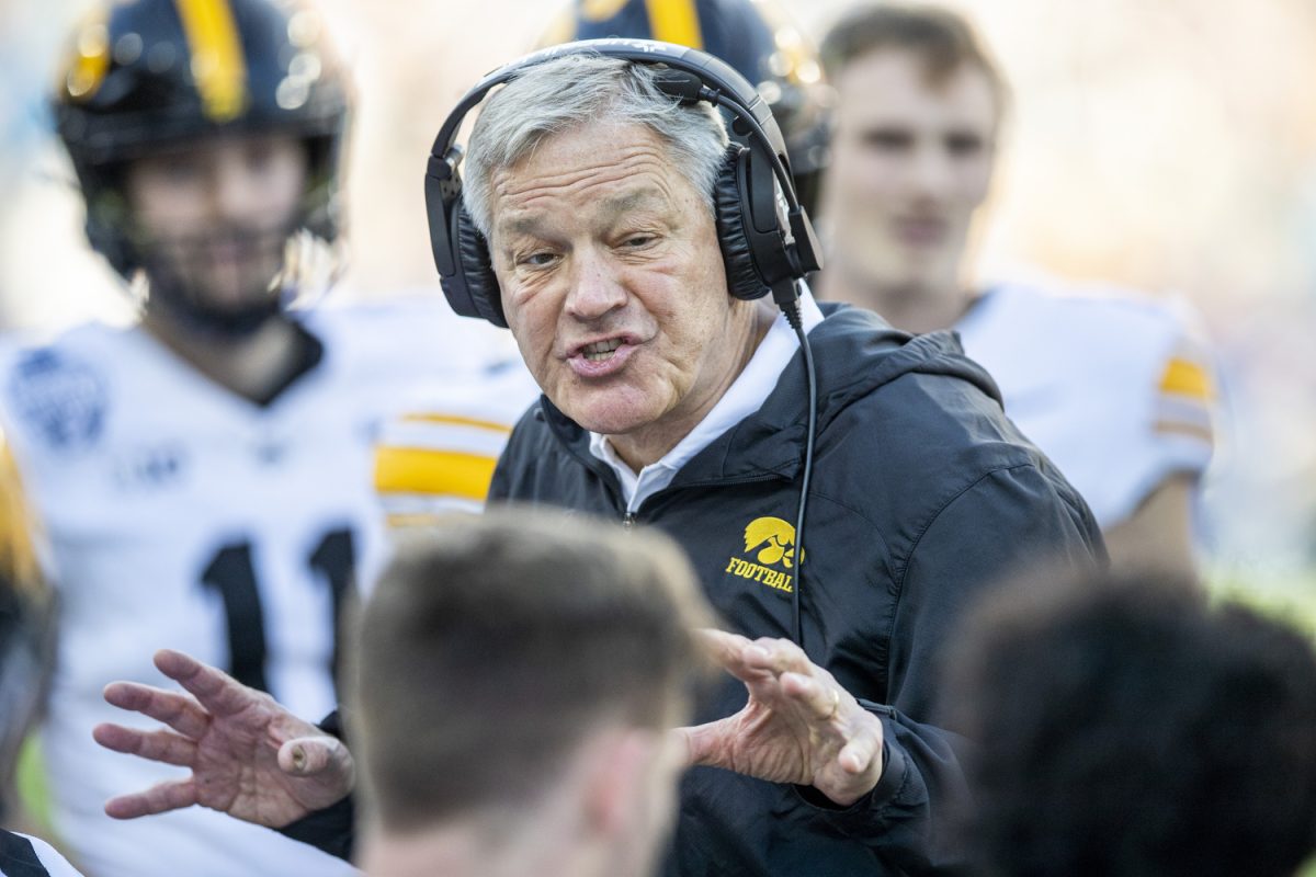 Iowa head coach Kirk Ferentz instructs defensive players during the TransPerfect Music City Bowl between Iowa and Missouri at Nissan Stadium in Nashville, Tenn., on Monday, Dec. 30, 2024. Following the first half, Iowa leads Missouri 21-14.