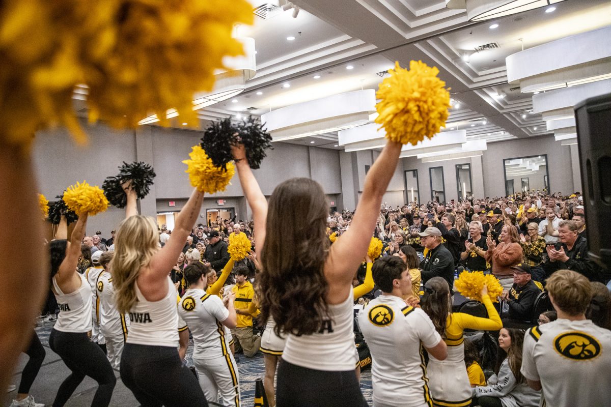 Iowa cheer members perform during the TransPerfect Music City Bowl Hawkeye Huddle at the Sheraton Grand Nashville Downtown in Nashville, Tenn., on Sunday, Dec. 29, 2024. The Huddle was sponsored by the I-Club, Office of Alumni Engagement, and the Iowa Swarm Collective. Hundreds of fans gathered for music, refreshments, and guest speakers Gary Dolphin, Beth Goetz, and Pat Angerer. The Iowa Hawkeyes and Missouri Tigers will face off in the 2024 TransPerfect Music City Bowl on Monday, Dec. 30, at Nissan Stadium.