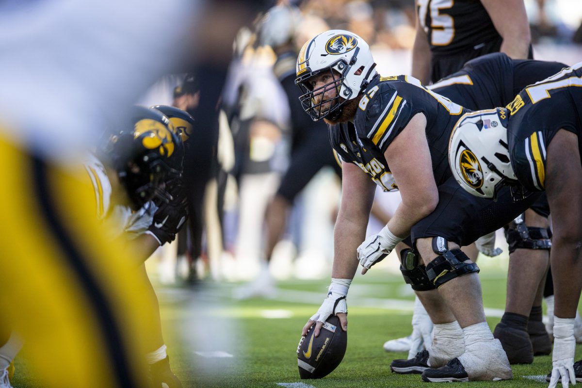 Missouri offensive lineman Drake Heismeyer prepares to snap the ball during the TransPerfect Music City Bowl between Iowa and Missouri at Nissan Stadium in Nashville, Tenn., on Monday, Dec. 30, 2024. The Tigers defeated the Hawkeyes 27-24.