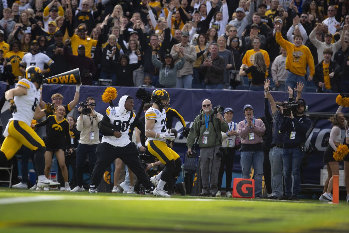 Iowa wide receiver Kaden Wetjen scores a touchdown during the 2024 TransPerfect Music City Bowl between Iowa and No. 19 Missouri at Nissan Stadium in Nashville, Tenn., on Monday, Dec. 30, 2024. The Tigers defeated The Hawkeyes 27-24.