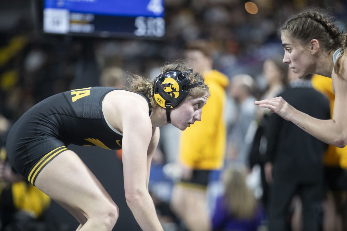 Iowa 110-pound Ava Bayless wrestles Life University Kaci Brice during session one of Soldier Salute at Xtream Arena in Coralville on Sunday, Dec. 29, 2024. The tournament hosted men’s and women’s matches from top-ranked schools. Bayless won by fall at 1:01.