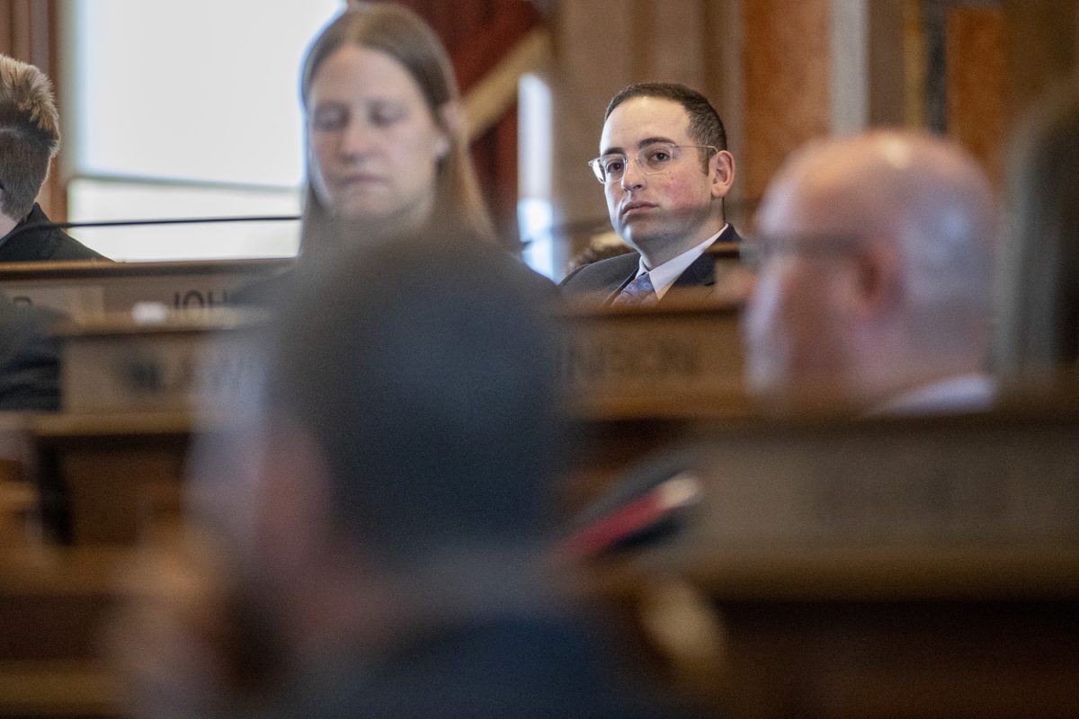 Iowa Rep. Adam Zabner listens to a speaker during the first day of the 2025 Iowa legislative session at the Iowa State Capitol in Des Moines on Monday, Jan. 13, 2025. Zabner has been a Representative since 2023.