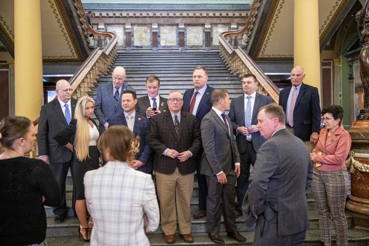 Iowa Senators prepare for a portrait during the State of the Judiciary address at the Iowa State Capitol in Des Moines on Wednesday, Jan. 15, 2025.
