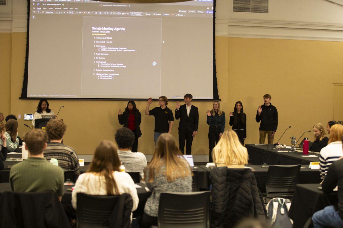 New senators are sworn in during a meeting of the Undergraduate Student Government in the Iowa Memorial Union on Tuesday, Jan 28, 2025. USG swore in six new members and welcomed the campus Ombudsperson to speak about his role.