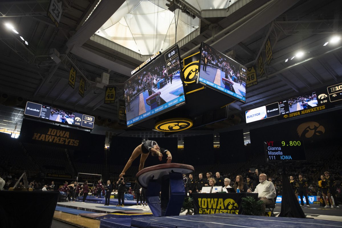 Avery Chambers completes a vault during a gymnastics meet between Iowa and Minnesota at Caver-Hawkeye Arena on Jan. 26, 2025. Chambers scored a 9.850 on Vault.