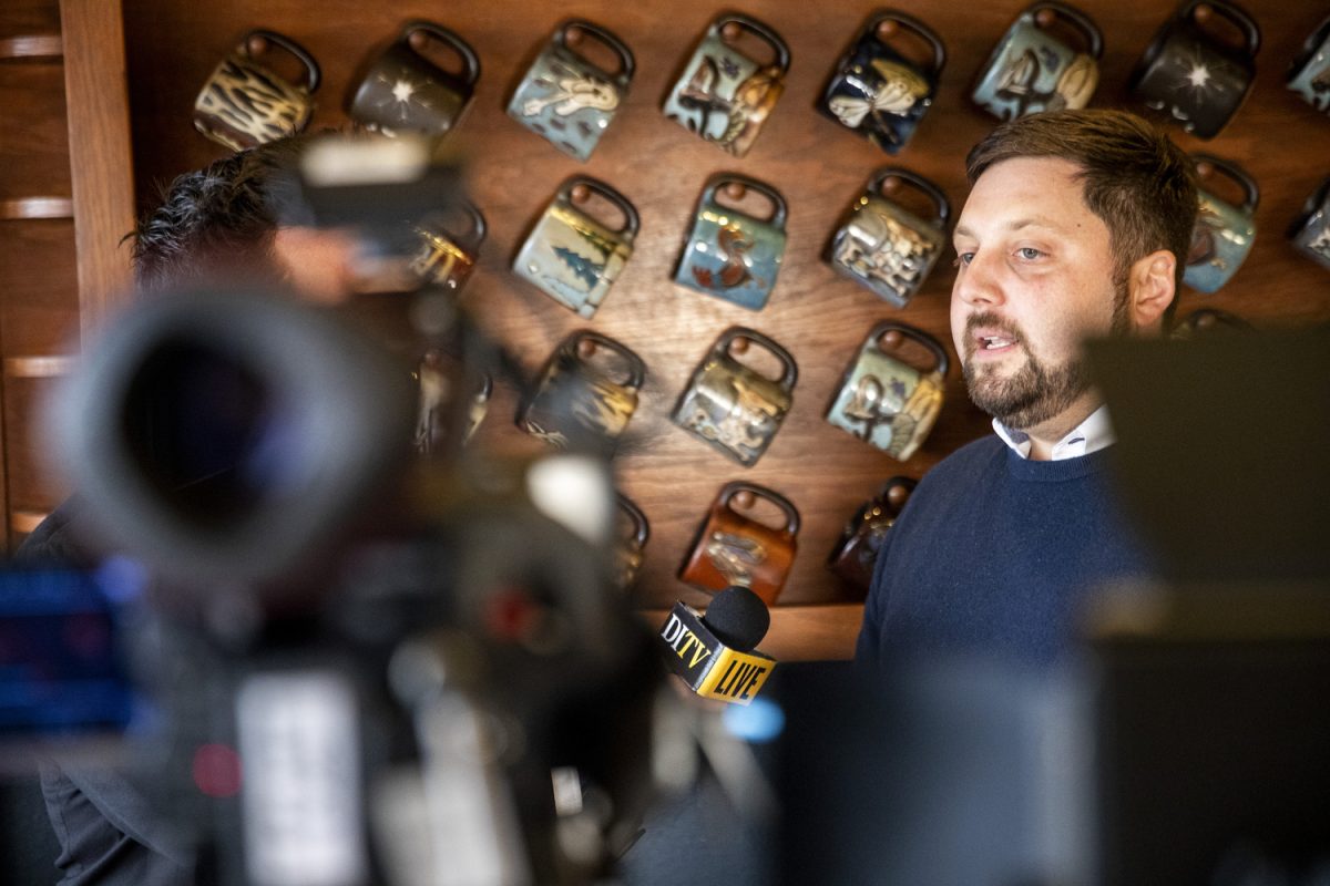 Iowa City Council special elections candidate Ross Nusser speaks in an interview during a meet and greet at Java House in Iowa City on Friday, Feb.14, 2025. 