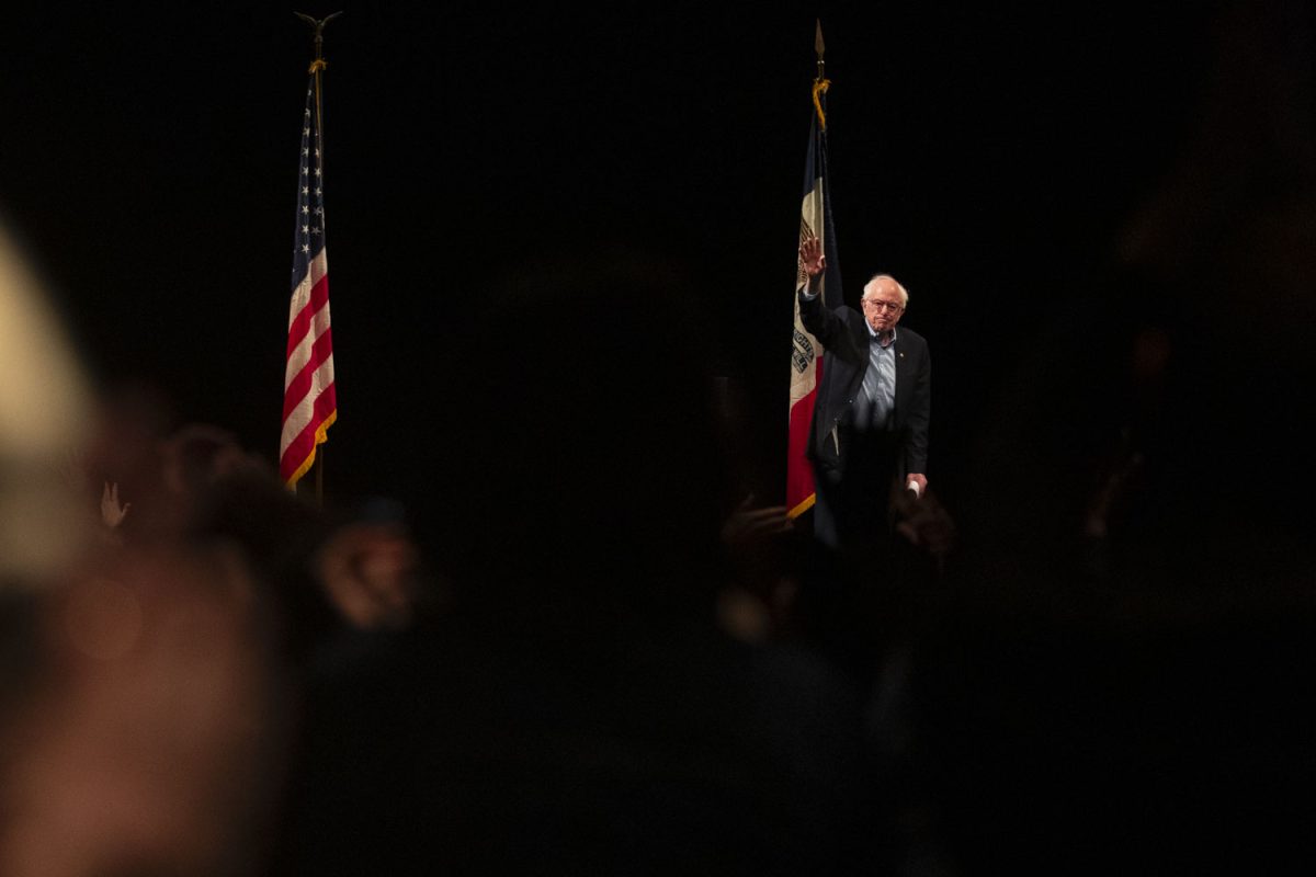 Bernie Sanders waves goodbye after Fighting Oligarchy: Where We Go From Here with Bernie Sanders at The Englert Theatre in Iowa City on Saturday, Feb. 22, 2025.
