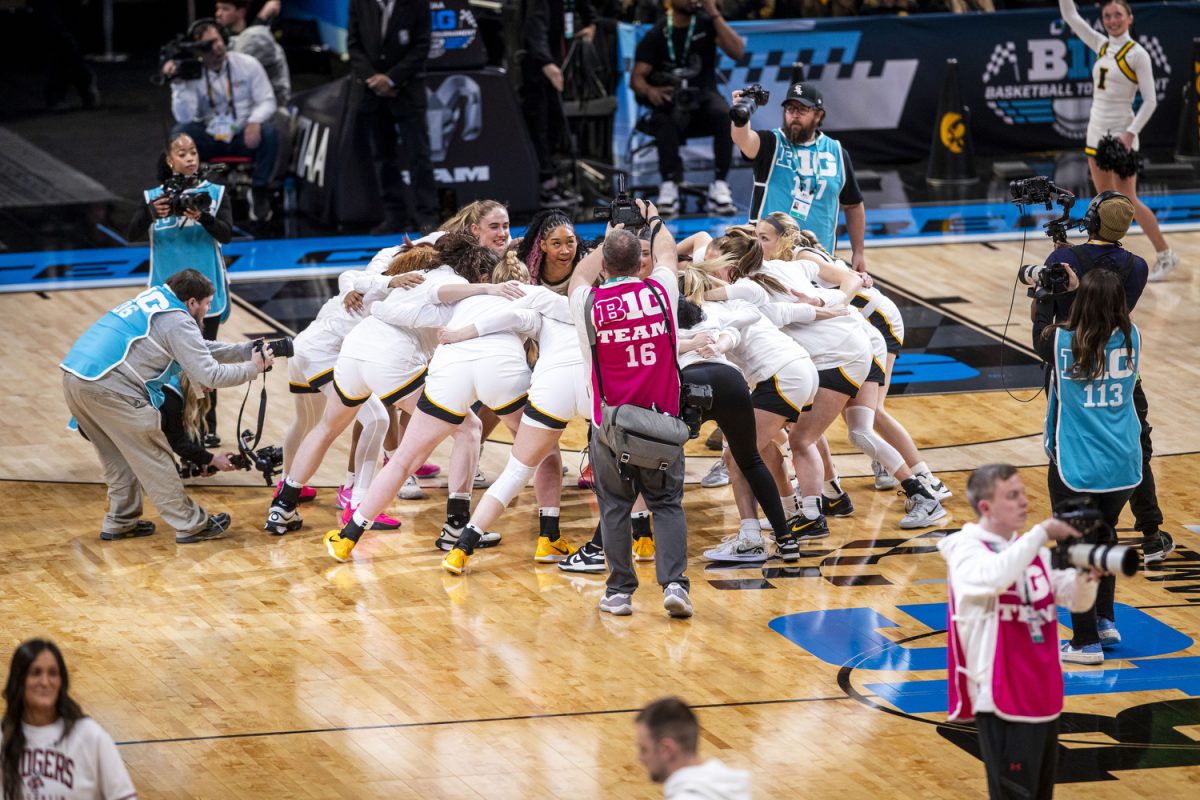 Iowa huddles during a basketball game between No. 11 Iowa and No. 14 Wisconsin at the TIAA Big Ten Women’s Basketball Tournament at Gainbridge Fieldhouse in Indianapolis, Ind. on Wednesday, March 5, 2025.