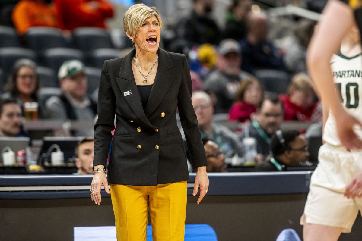 Iowa head coach Jan Jensen yells during a basketball game between No. 11 Iowa and No. 6 Michigan State at the TIAA Big Ten Women’s Basketball Tournament at Gainbridge Fieldhouse in Indianapolis, Ind. on Thursday, March 6, 2025. 