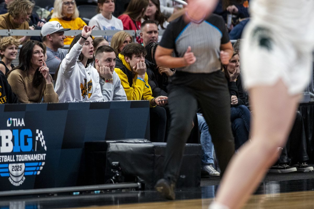Caitlin Clark signals during a basketball game between No. 11 Iowa and No. 6 Michigan State at the TIAA Big Ten Women’s Basketball Tournament at Gainbridge Fieldhouse in Indianapolis, Ind. on Thursday, March 6, 2025. 