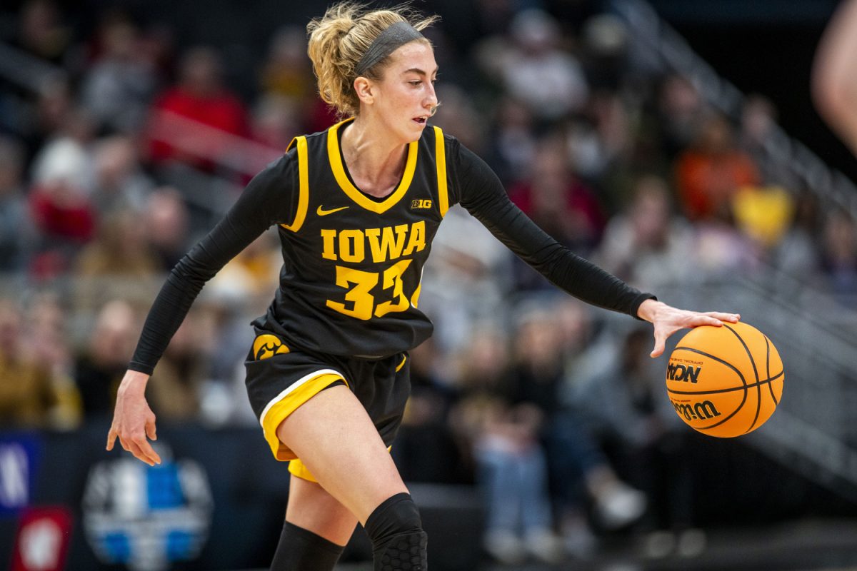 Iowa guard Lucy Olsen dribbles the ball during a basketball game between No. 11 Iowa and No. 6 Michigan State at the TIAA Big Ten Women’s Basketball Tournament at Gainbridge Fieldhouse in Indianapolis, Ind. on Thursday, March 6, 2025. 