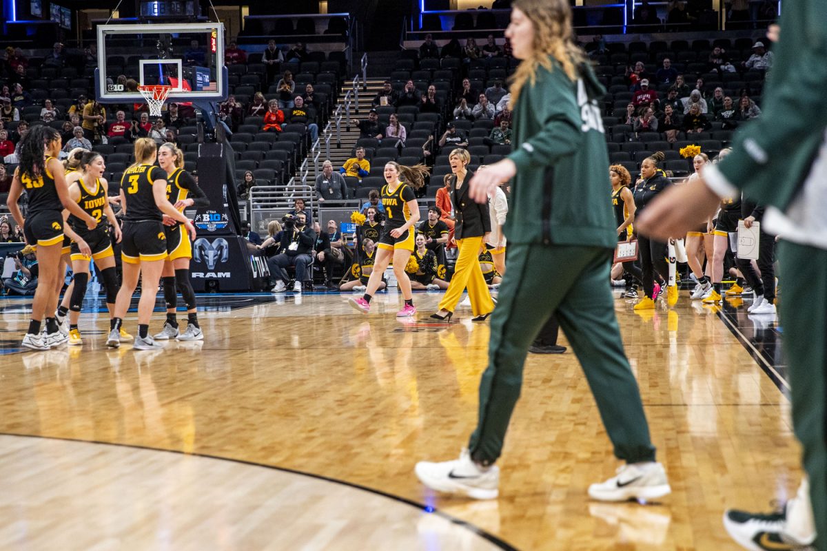 Iowa team members cheer after Michigan State calls a timeout during a basketball game between No. 11 Iowa and No. 6 Michigan State at the TIAA Big Ten Women’s Basketball Tournament at Gainbridge Fieldhouse in Indianapolis, Ind. on Thursday, March 6, 2025.