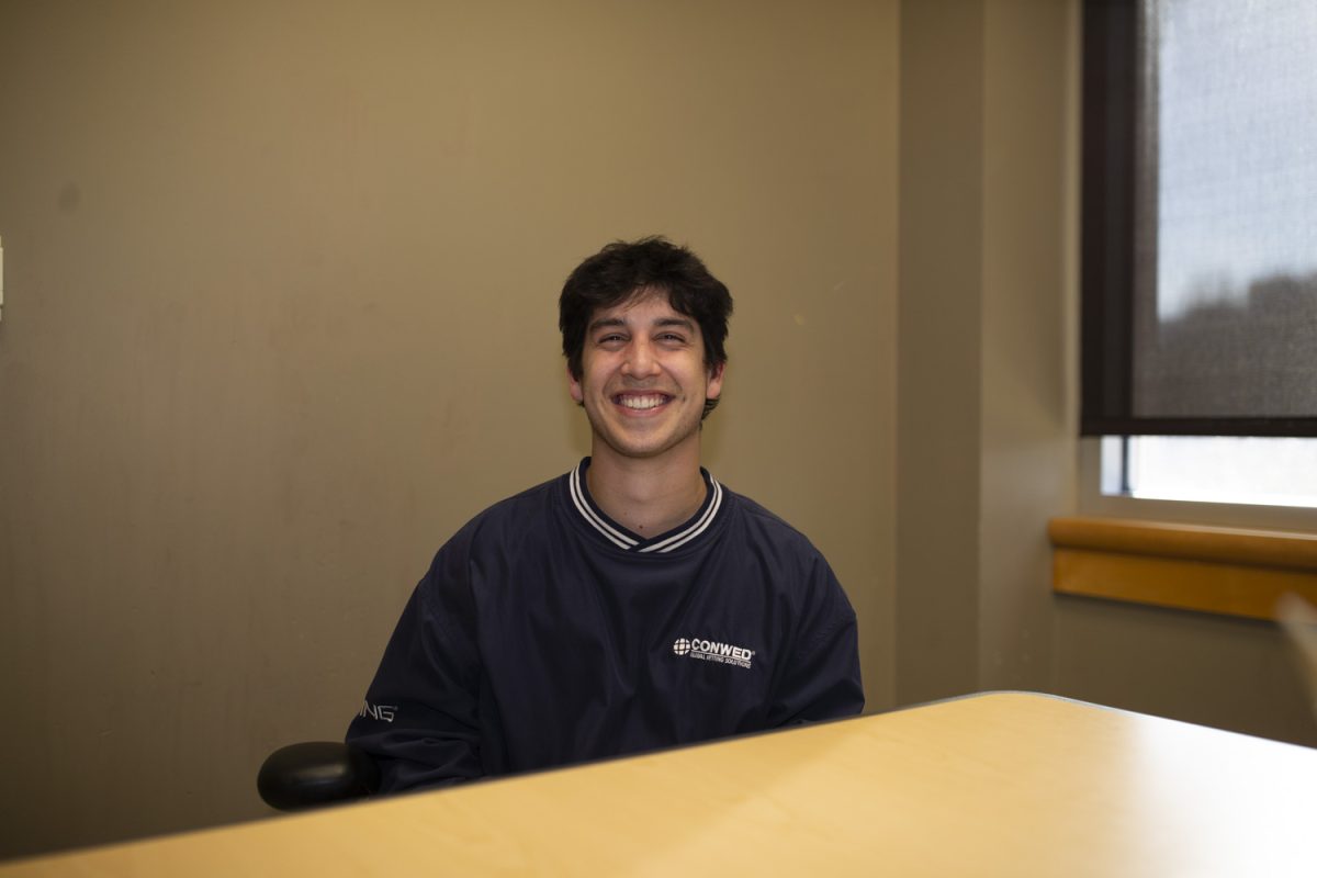 David Finnegan poses for a portrait in Iowa City on Saturday, March 8, 2025.