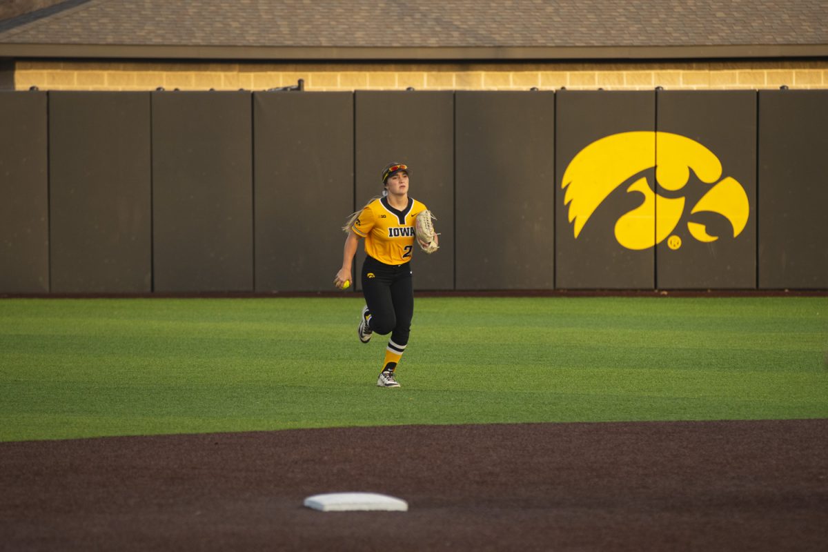 Iowa outfielder Devin Simon runs towards the dugout during a women's softball game between Iowa and St. Thomas at Bob Pearl Softball Field in Iowa City on Mar. 12, 2025. The Hawkeyes defeated St. Thomas, 1-0.