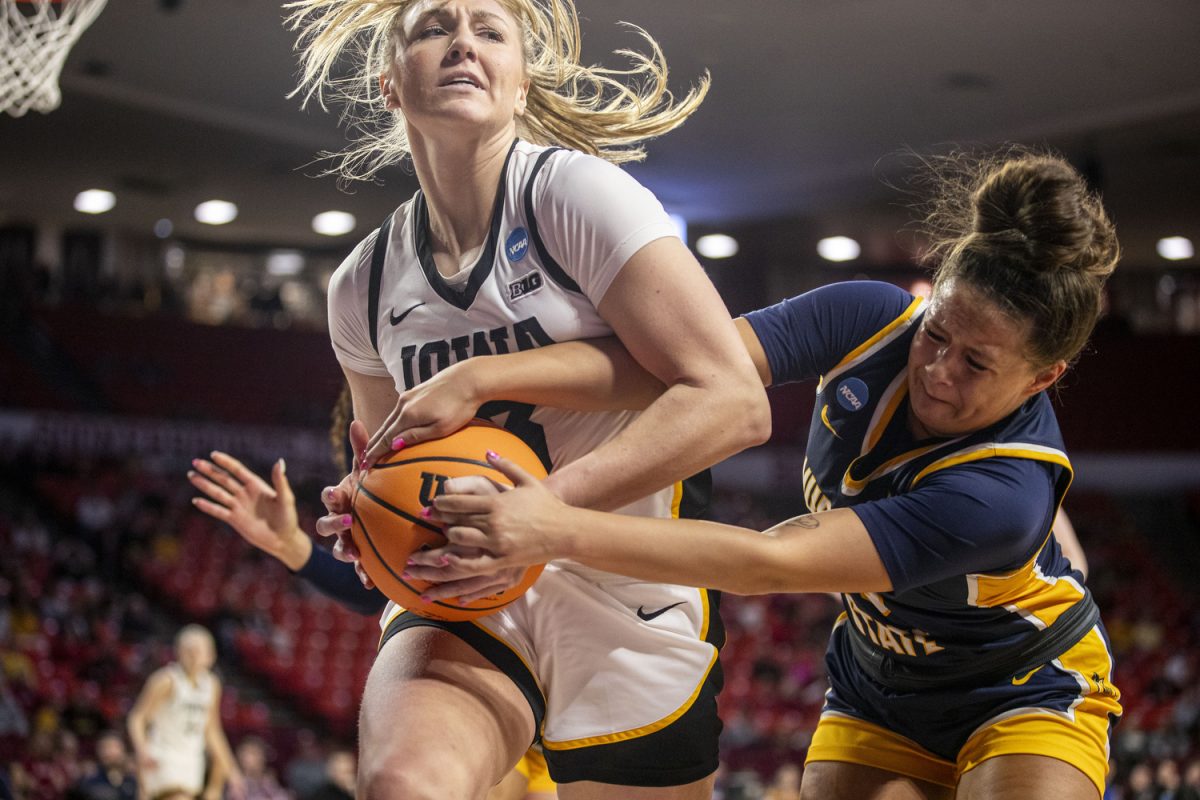 Iowa guard Sydney Affolter fights for ball control during a NCAA Tournament First Round game between the No. 6 Iowa Hawkeyes and the No. 11 Murray State Racers at Lloyd Noble Center in Norman, Okla., on Saturday, March 22, 2025. 