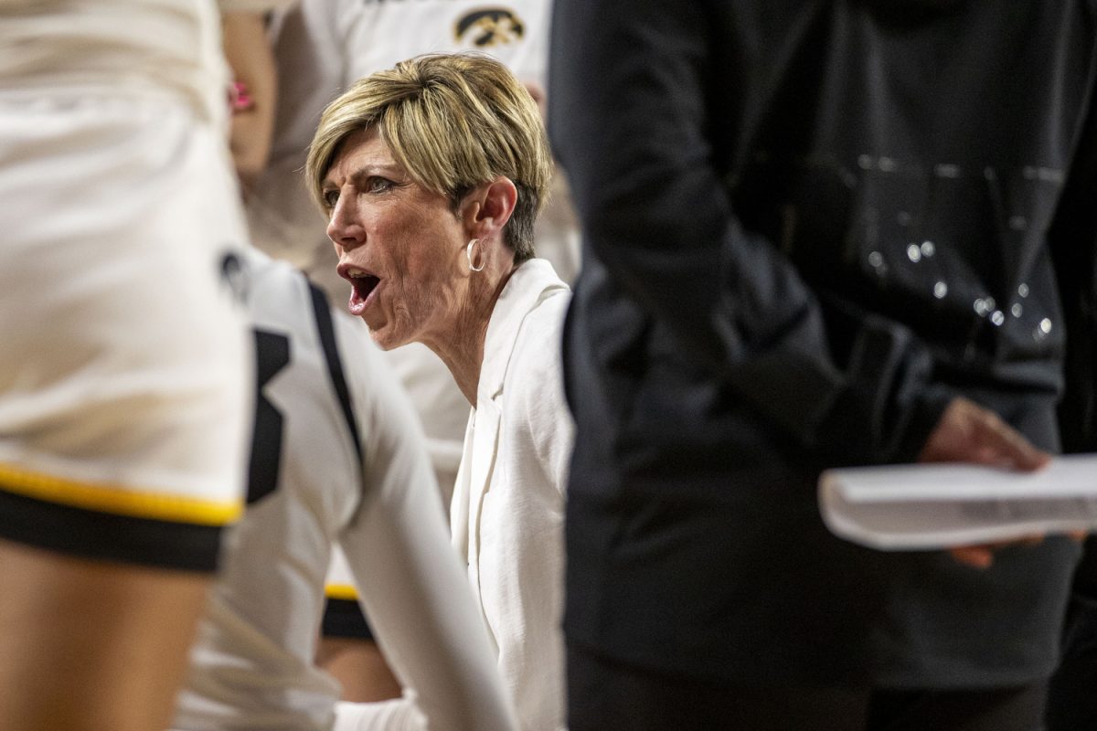 Iowa head coach Jan Jensen instructs players in a timeout during a NCAA Tournament First Round game between the No. 6 Iowa Hawkeyes and the No. 11 Murray State Racers at Lloyd Noble Center in Norman, Okla., on Saturday, March 22, 2025. 