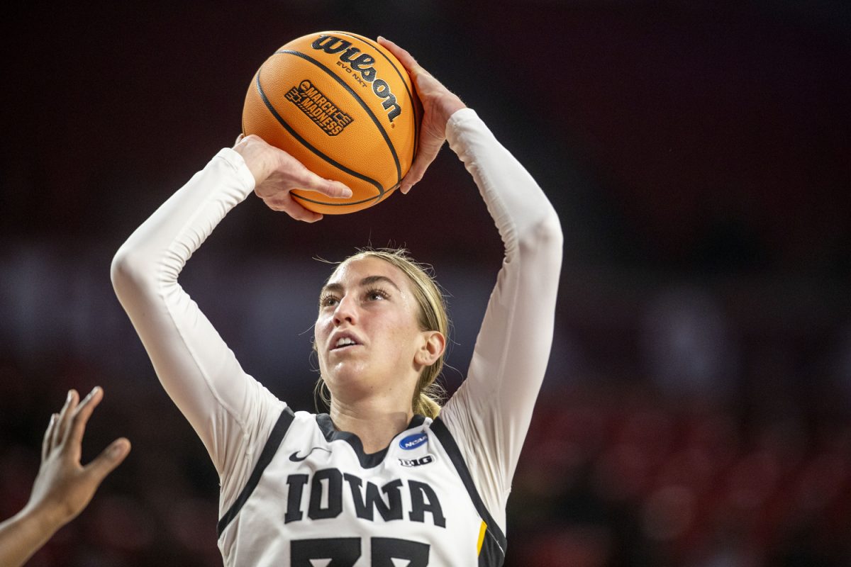 Iowa guard Lucy Olsen goes up for a shot during a NCAA Tournament First Round game between the No. 6 Iowa Hawkeyes and the No. 11 Murray State Racers at Lloyd Noble Center in Norman, Okla., on Saturday, March 22, 2025. 