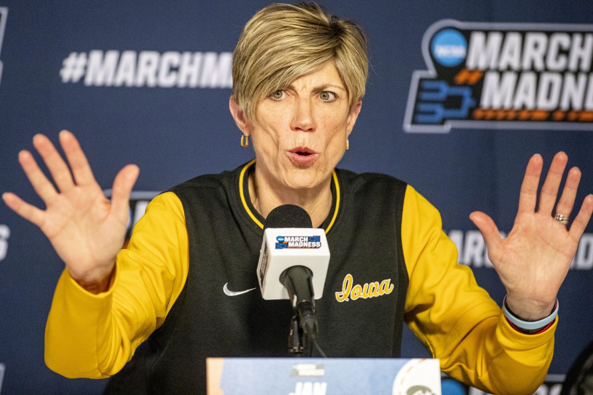 Iowa head coach Jan Jensen answers questions during a day of press conferences and interviews ahead of the NCAA Tournament Second Round game between the No. 6 Iowa Hawkeyes and the No. 3 Oklahoma Sooners at Lloyd Noble Center in Norman, Okla., on Sunday, March 23, 2025. Tipoff is set for 3:00 p.m. CT.