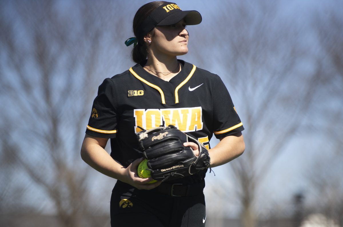 Iowa’s IF, Devin Bowman, warms up before entering the non-conference double header between the Iowa Hawkeyes and the South Dakota State Jackrabbits at Bob Pearl Softball Field in Iowa City, Iowa on Tuesday, March 25, 2025. The Hawkeyes defeated the Jackrabbits 7-1 and 2-0.
