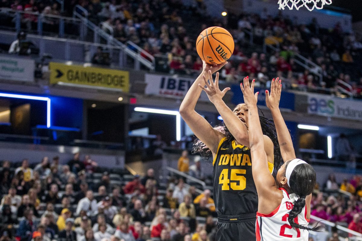 Iowa forward Hannah Stuelke goes up for a shot during a basketball game between No. 11 Iowa and No. 3 Ohio State at the TIAA Big Ten Women’s Basketball Tournament at Gainbridge Fieldhouse in Indianapolis, Ind. on Friday, March 7, 2025. 
