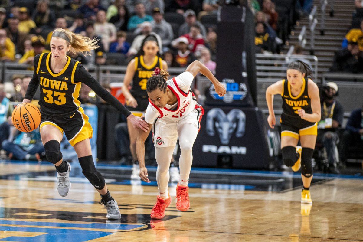 Iowa guard Lucy Olsen steals the ball during a basketball game between No. 11 Iowa and No. 3 Ohio State at the TIAA Big Ten Women’s Basketball Tournament at Gainbridge Fieldhouse in Indianapolis, Ind. on Friday, March 7, 2025. 