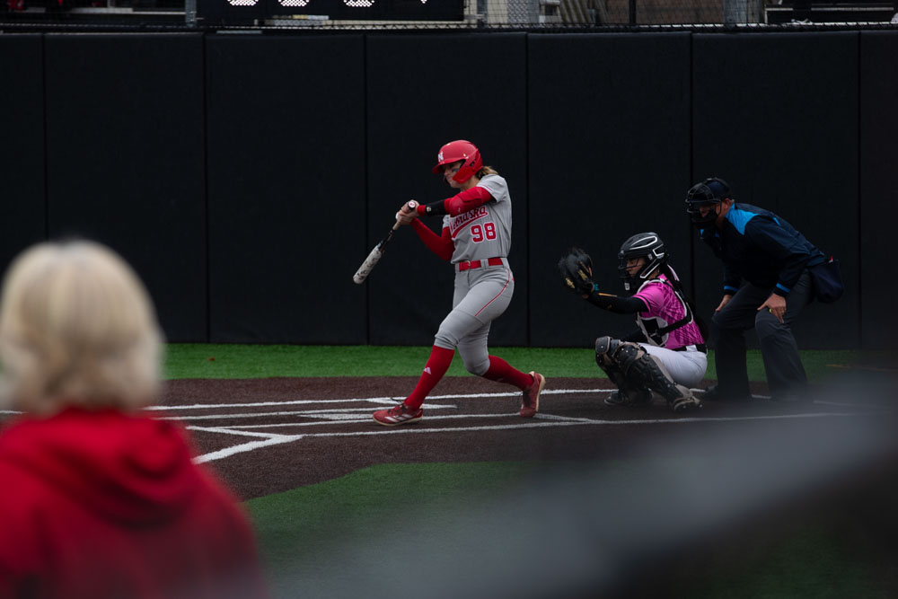 Iowa pitcher Jordyn Bahl swinging her bat during a women’s softball game between Iowa and Nebraska at Bob Pearl Softball Field in Iowa City on April 4, 2025. The Cornhuskers defeated the Hawkeyes, 12-0.