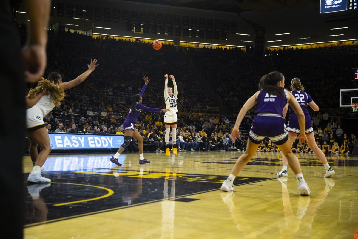 Lucy Olsen shoots the ball during a women's basketball game between Iowa and Northwestern at Carver-Hawkeye Arena in Iowa City on Tuesday, Jan. 28, 2024. The Hawkeyes defeated the Wildcats 85-80.