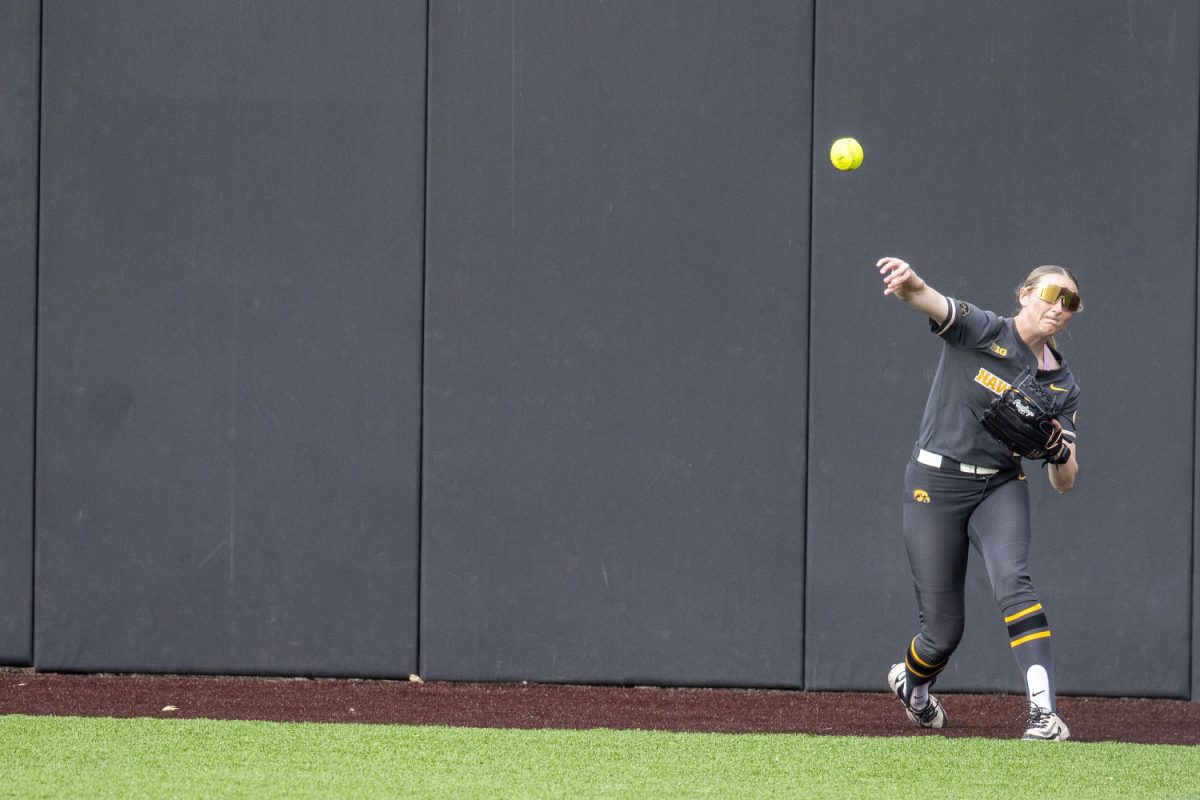 Iowa outfielder Tory Bennett throws the ball during a softball game between the Iowa Hawkeyes and Penn State Nittany Lions at Bob Pearl Softball Field in Iowa City on Saturday, April 19, 2025. The Hawkeyes defeated the Nittany Lions 2-1. Bennett had four putouts.