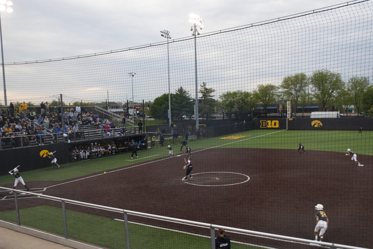 Bases are fully loaded as Hawkeye outfielder Tory Bennett is up to bat during the first softball game of the series between the Iowa Hawkeyes and the Rutgers Scarlet Knights at Bob Pearl Field in Iowa City on Friday, May 2, 2025. The Hawkeyes defeated the Knights 4-3, taking the first game of the series.
