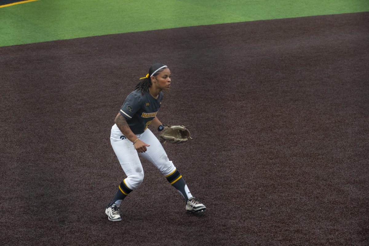 Hawkeye infielder Avery Jackson prepares for the pitch during the first softball game of the series between the Iowa Hawkeyes and the Rutgers Scarlet Knights at Bob Pearl Field in Iowa City on Friday, May 2, 2025. The Hawkeyes defeated the Knights 4-3, taking the first game of the series.