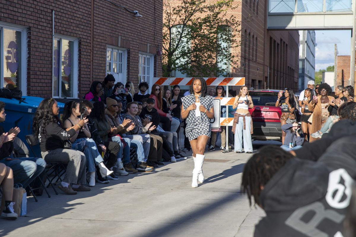 Models walk the runway during the Beyond Fashion Festival’s Streetwear Fashion Show down the alleyway of Studio 13 on Saturday, May 3, 2025. Events were held throughout Friday and Saturday around Iowa City.