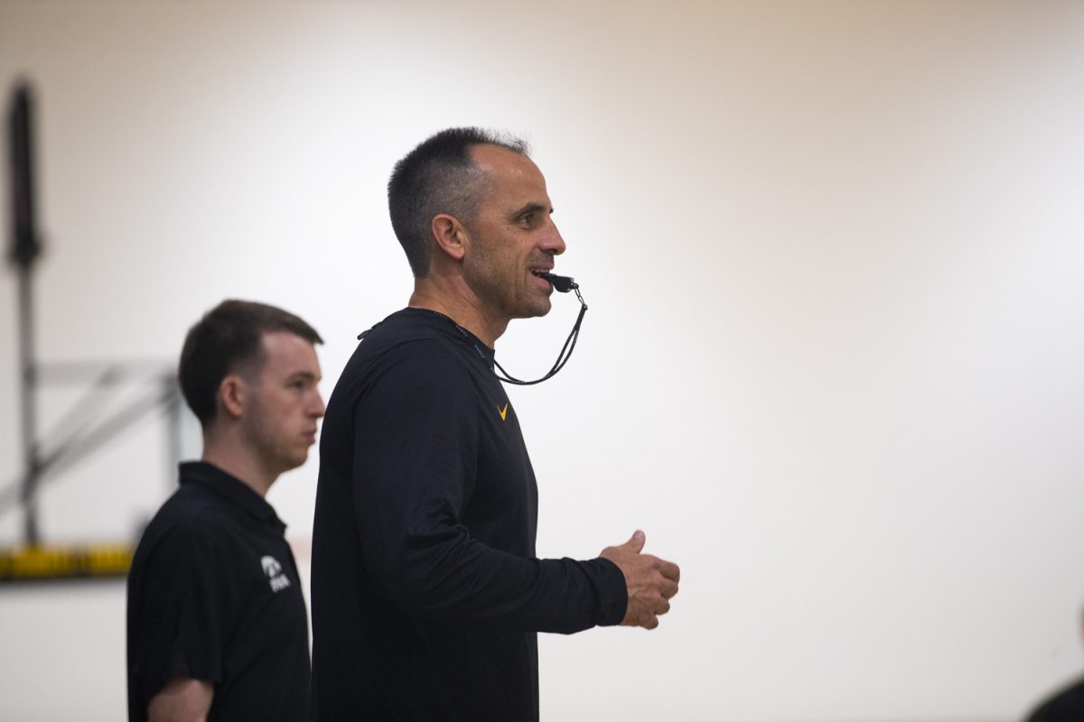 Iowa head coach Ben McCollum watches during an Iowa mens basketball practice at Carver-Hawkeye Arena on Thursday June 19, 2025.