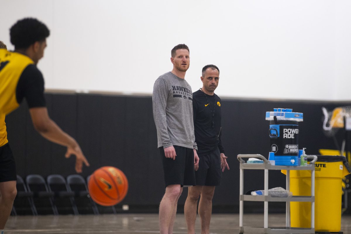 Iowa head coach Ben McCollum watches during an Iowa mens basketball practice at Carver-Hawkeye Arena on Thursday June 19, 2025.