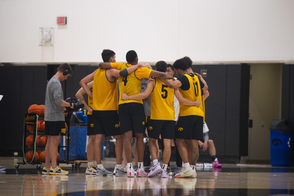 Iowa players huddle during an Iowa mens basketball practice at Carver-Hawkeye Arena on Thursday June 19, 2025.
