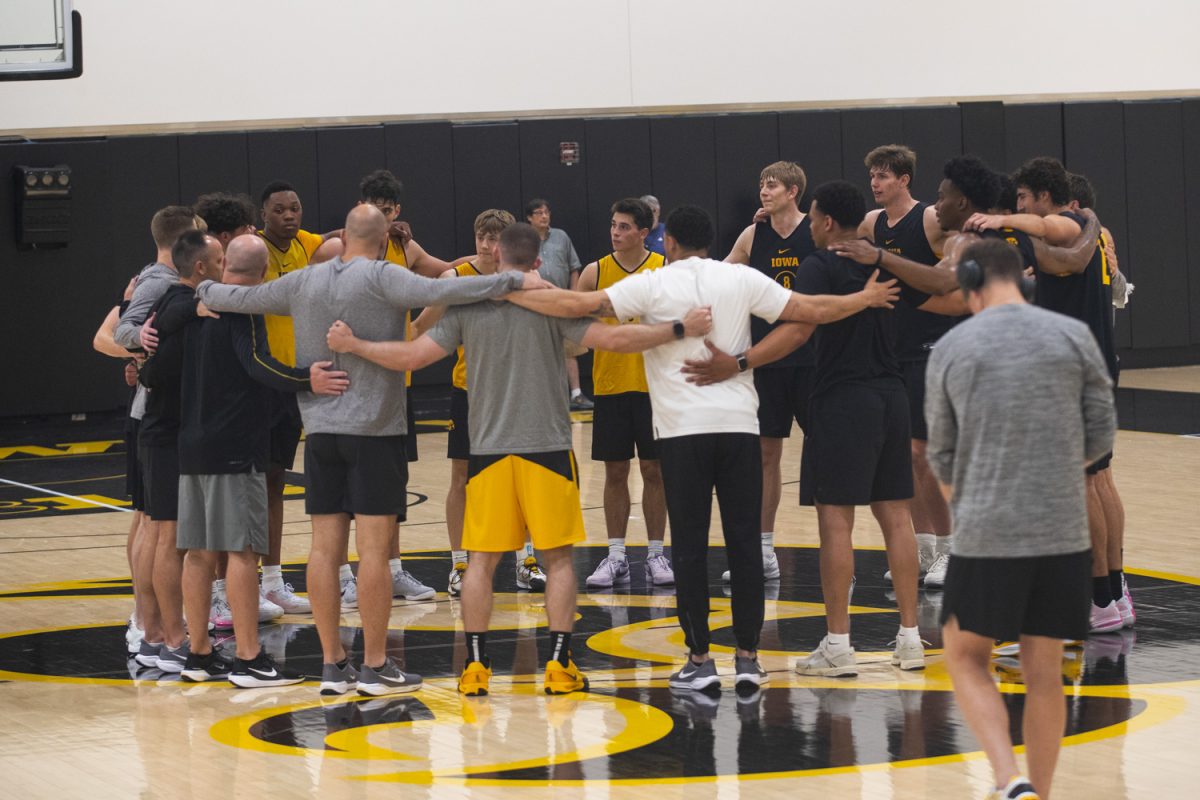 Iowa players huddle during an Iowa mens basketball practice at Carver-Hawkeye Arena on Thursday June 19, 2025.
