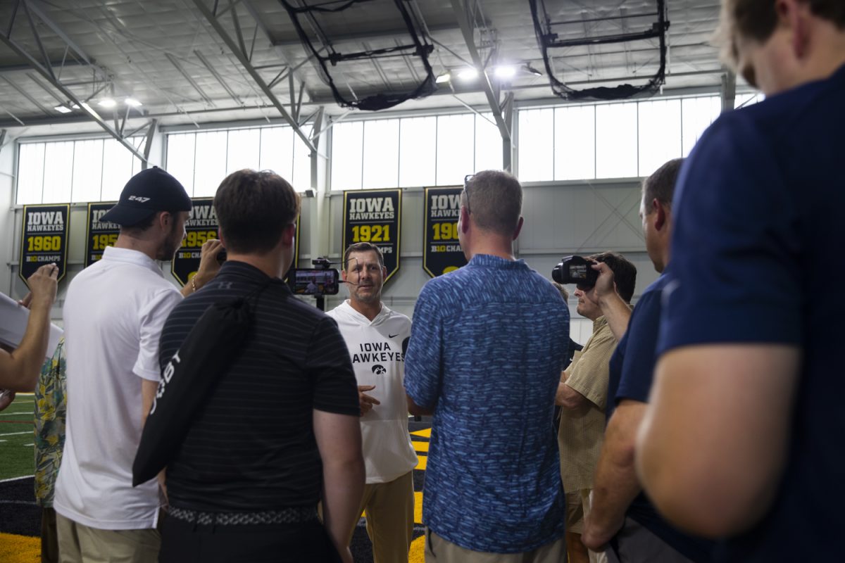 Iowa offensive coordinator Tim Lester answers questions during the Iowa Football Media Day on Friday, August 9, 2025. Lester is in his second year as offensive coordinator and quarterbacks coach at the University of Iowa.