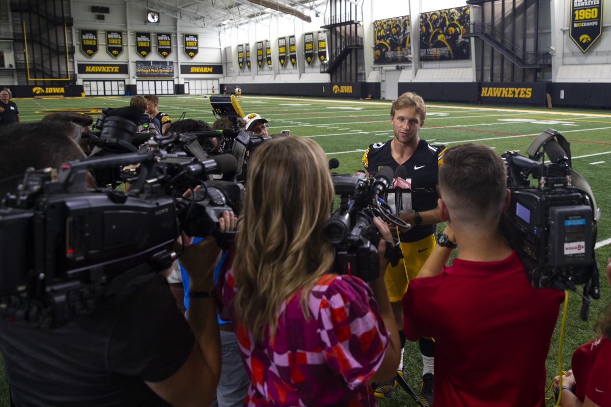 Iowa quarterback Mark Gronowski answers questions during the Iowa Football Media Day on Friday, August 9, 2025. Gronowski transferred to the Hawkeyes from South Dakota State University.