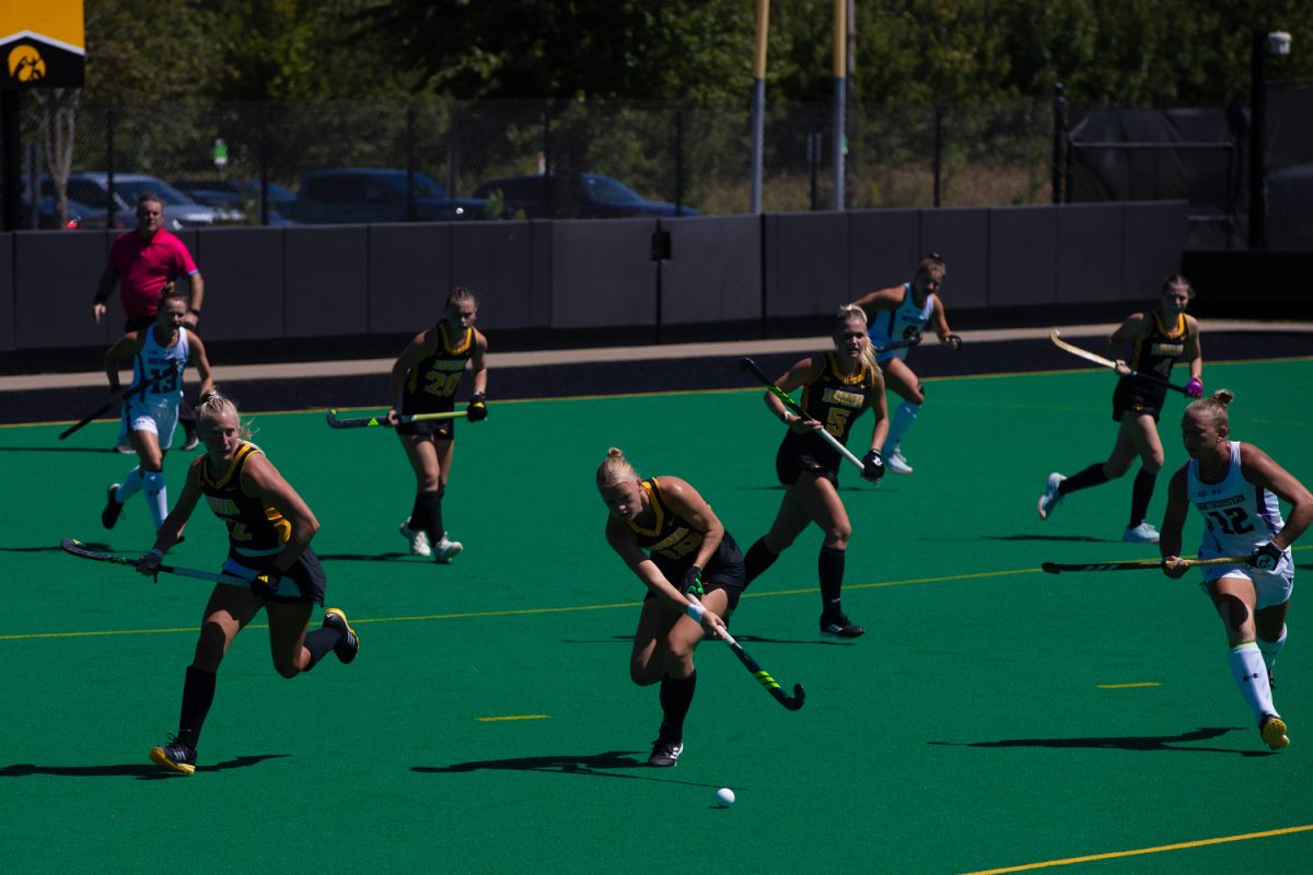 Iowa Midfielder Dionne Van Aalsum gets control of the ball during the Iowa Field Hockey Exhibition against Northwestern on Saturday, August 23, 2025. The game went into a tie-breaking sudden death round to declare a winner.
