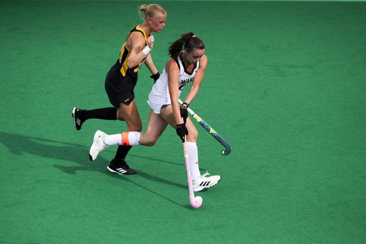 Wake Forest player Mia Montag defends against Iowa midfielder Dionne Van Aalsum during a field hockey game between No. 15 Iowa and No. 20 Wake Forest at Grant Field in Iowa City on Friday, Aug. 29, 2025. The Hawkeyes defeated the Demon Deacons 5-4.