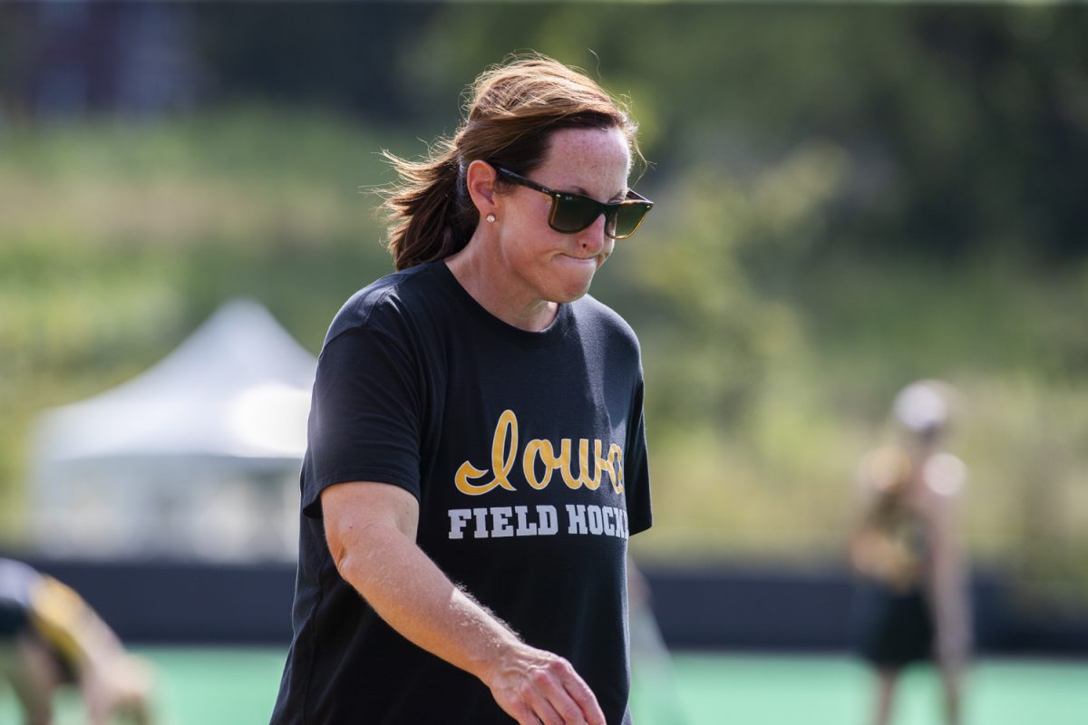 Iowa head coach Lisa Cellucci walks down the field during a field hockey game between No. 15 Iowa and No. 20 Wake Forest at Grant Field in Iowa City on Friday, Aug. 29, 2025. The Hawkeyes defeated the Demon Deacons 5-4.