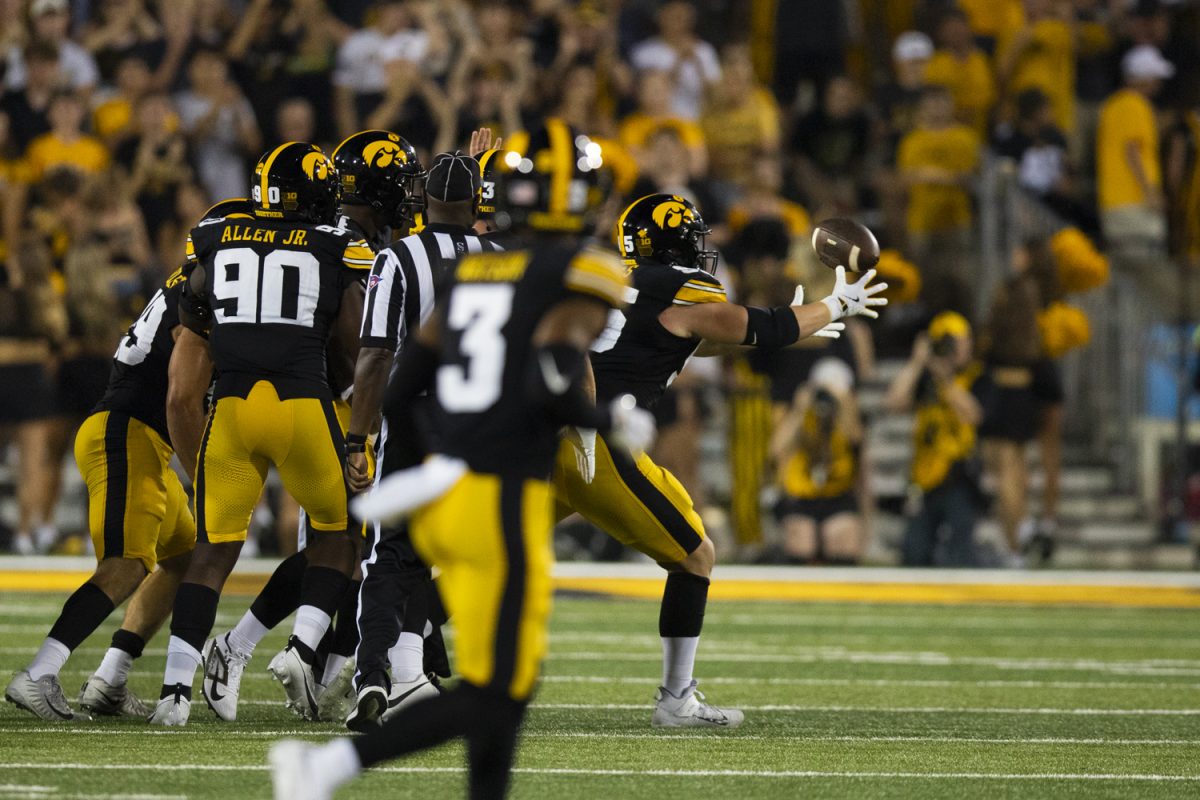 Iowa defensive lineman Aaron Graves records a sack during a football game between the Iowa Hawkeyes and the Albany Great Danes at Kinnick Stadium on Saturday, Aug. 30, 2025. The Hawkeyes defeated the Great Danes 34-7.