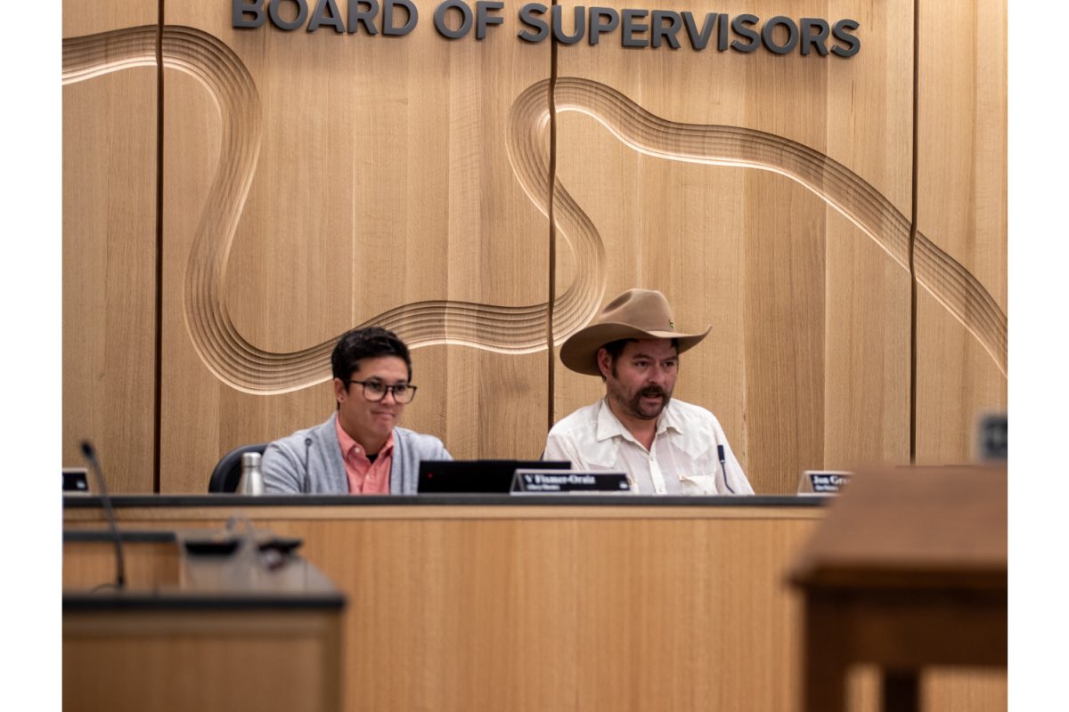 Chairperson Jon Green (right) leads the Johnson County Board of Supervisors meeting on August 27th, 2025.