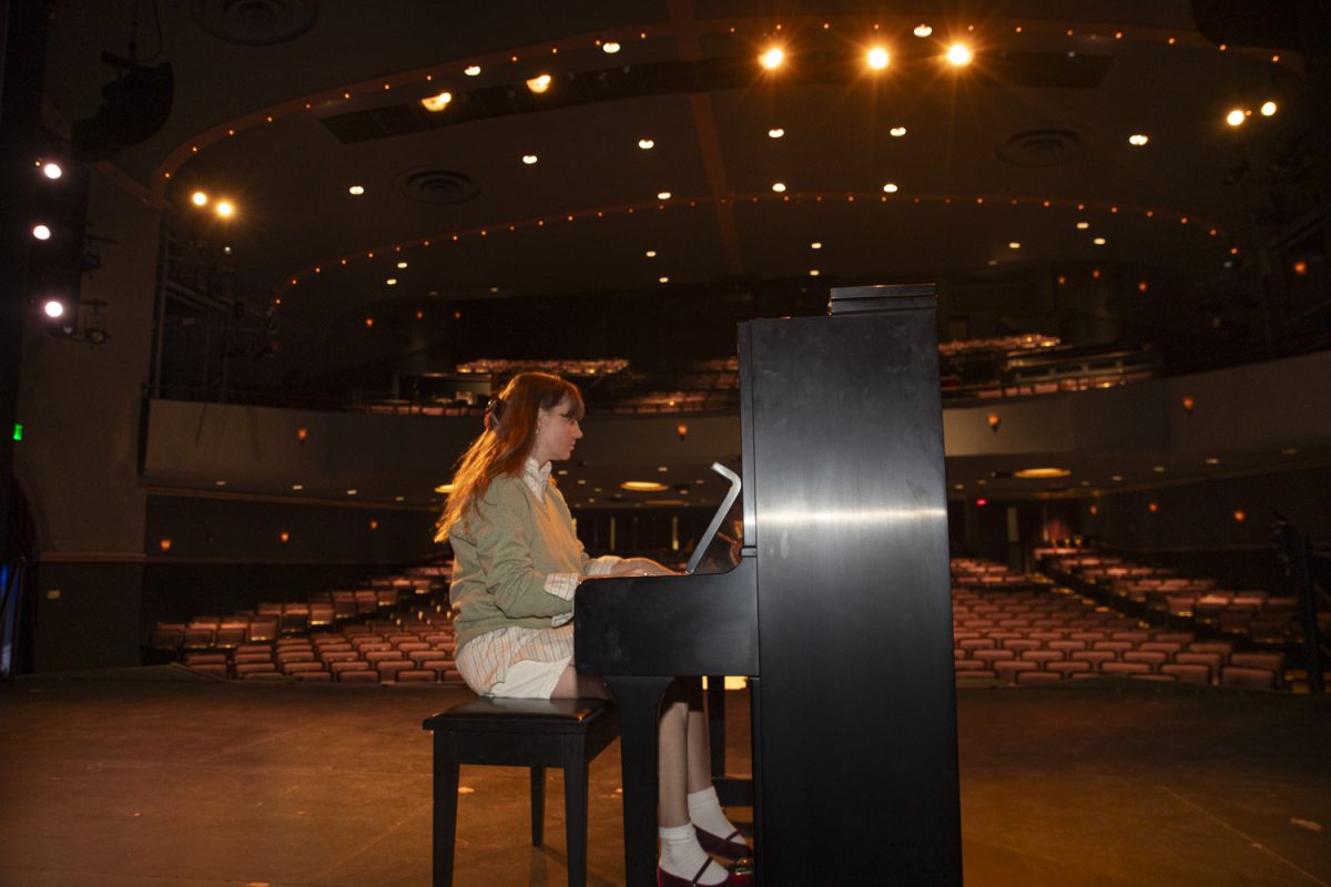 Courtney Marie Andrews poses for a portrait at the Englert Theater in Iowa City on Thursday, Sept 4, 2025. Andrews is the 2025 Iowa City Songwriters Festival Artist-In-Residence. She performed Thursday night at Trumpet Blossom cafe, and read from her poetry book Love Is A Dog That Bites When It’s Scared at Prairie Lights Books on Friday.