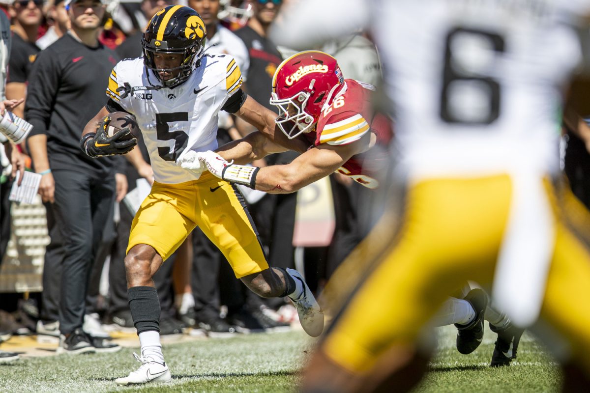 Iowa wide receiver Jacob Gill carries the ball during a football game between Iowa and No. 16 Iowa State in Ames, Iowa, on Sept. 6, 2025. 