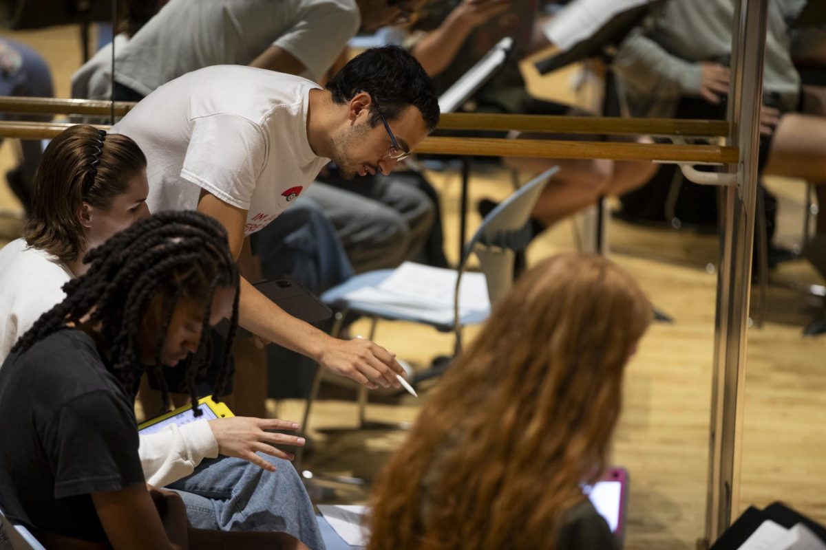 Playwright Adrian Enzastiga instructs at a rehearsal of Drag'daLore at the University of Iowa Theatre Building in Iowa City on Tuesday, Sept. 9, 2025. Actors first perform the reading on Saturday, Sept. 13.