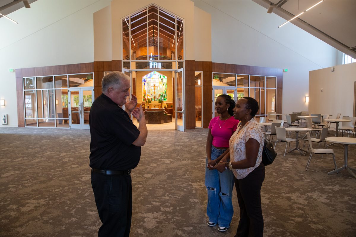 Father Chuck Adam speaks to parishioners at Saint Thomas More Church in Coralville on Thursday, Sept. 11, 2025. The Catholic church opened its doors recently after five years under construction.