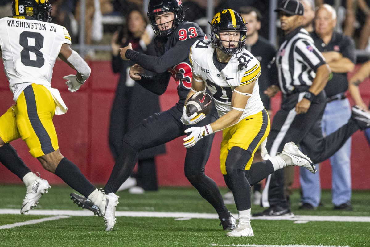 Iowa wide receiver Kaden Wetjen carries the ball into the end zone on a kick return for the opening play of the game during a football game between Iowa and Rutgers at SHI Stadium in Piscataway, N.J. on Sept. 19, 2025. (Cody Blissett / The Daily Iowan)